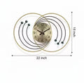 Gold And Brown Modern Decorative Wall Clock With D Metal Rings And Wooden Ball Accents