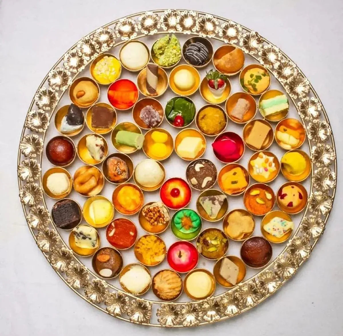 Assorted Miniature Desserts And Sweets Collection In Decorative Tray