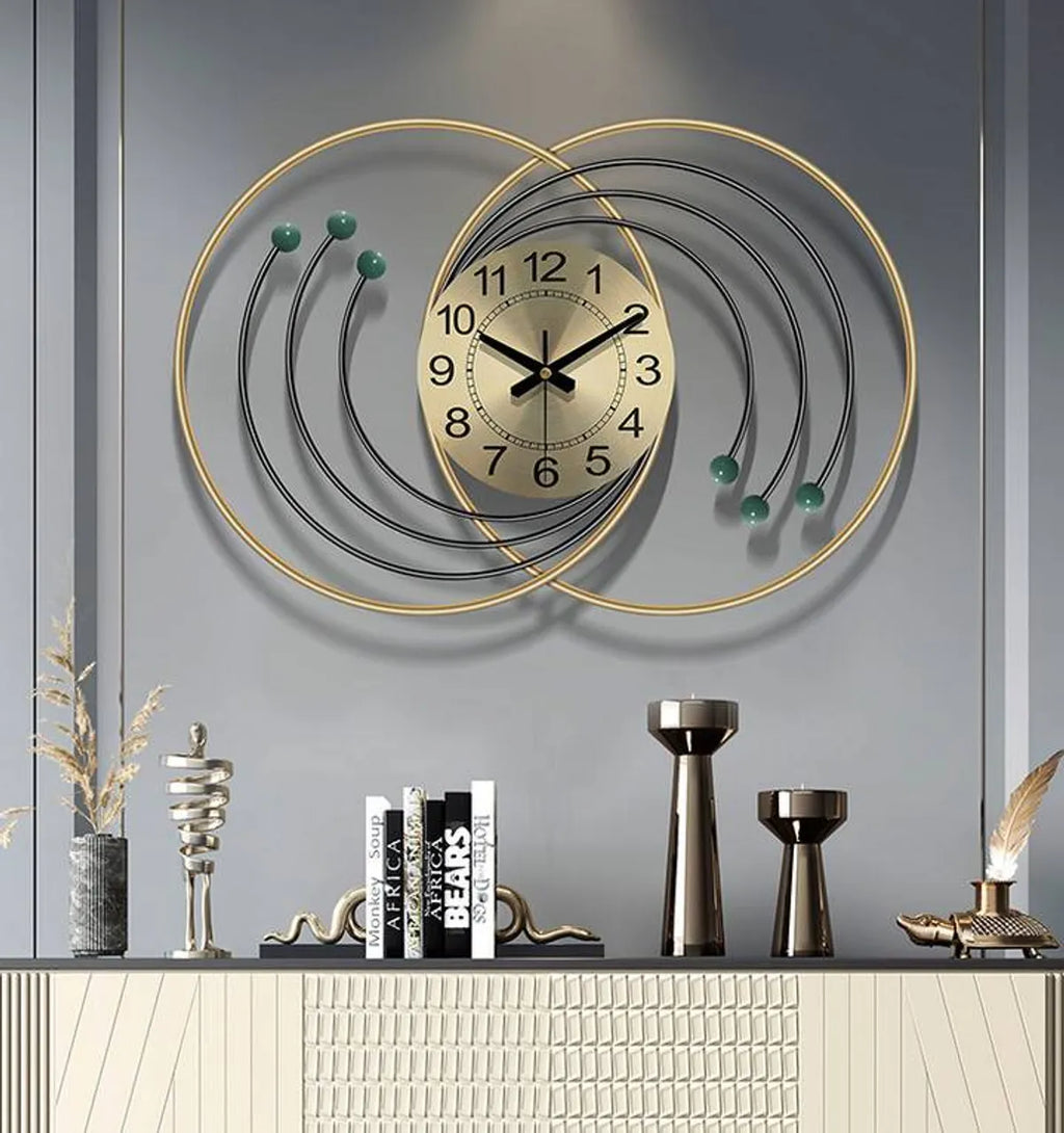 Gold And Brown Modern Decorative Wall Clock With D Metal Rings And Wooden Ball Accents