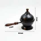 Black Metal Incense Burner With Wooden Handle And Decorative Cutouts